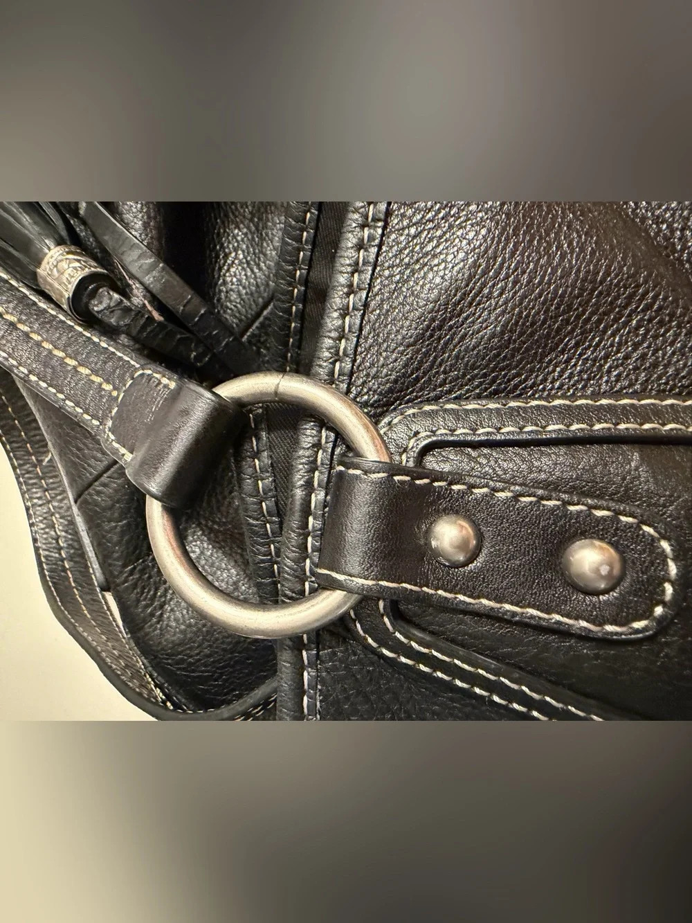 The Sak “PO Asbury” large pebbled black leather hobo/shoulder bag.